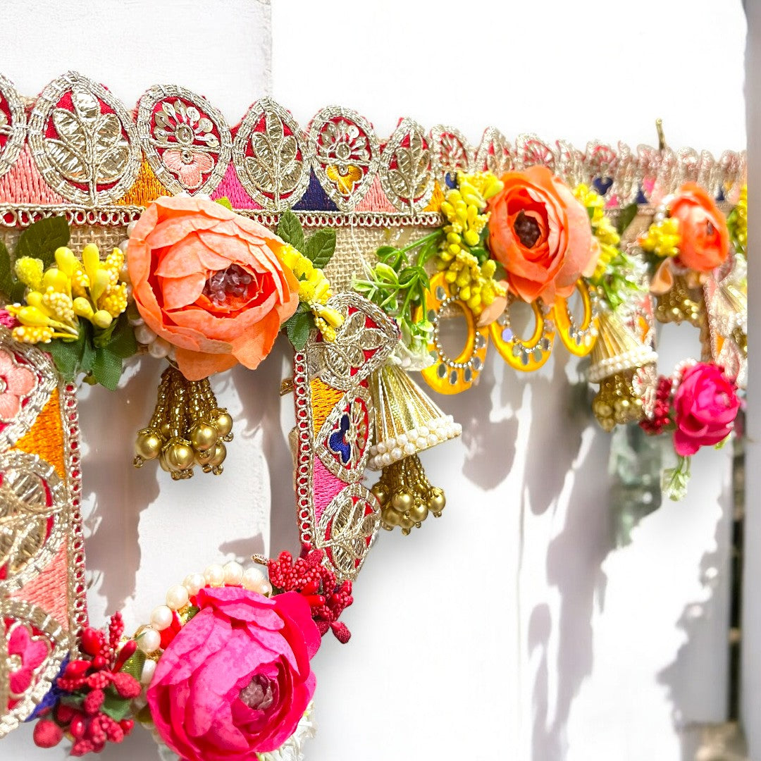 Vibrant Floral Toran with Roses & Golden Bells SP-T07